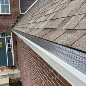 White Seamless Gutter System with Gutter Guards